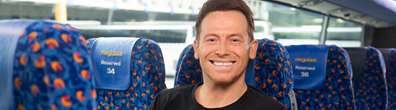 TV presenter, Joe Swash on a megabus coach