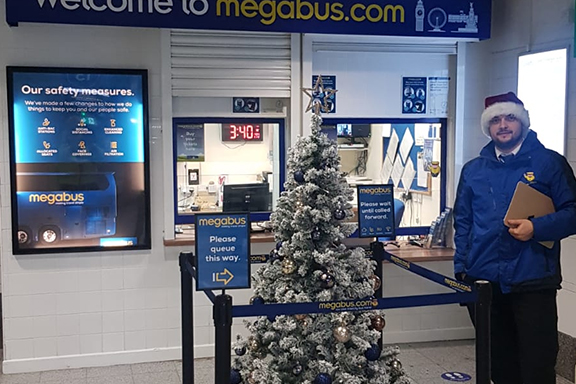megabus customer service desk at Christmas at London Victoria Coach Station